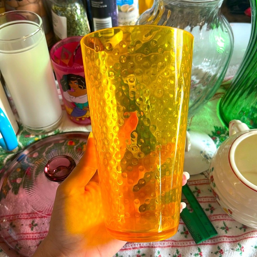 Orange yellow plastic cup